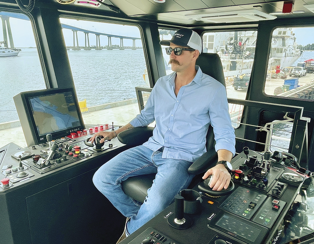 markey machine Capt. Joshua Ferguson steers eWolf into berth at the Port of San Diego in March. eWolf’s wheehouse is equipped with a JRC/Alphatron integrated bridge with displays that can retract into the dash.